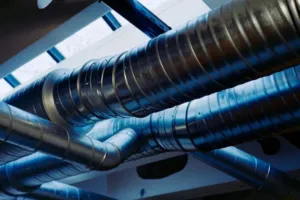 A wide shot of commercial ducting installation and inspections.